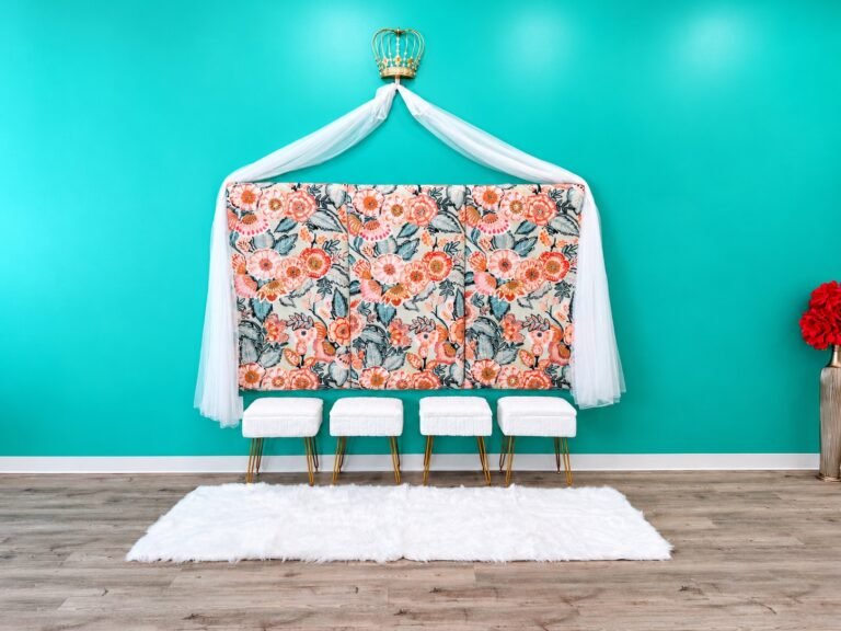 Floral seating area with white stools at Posh & Pearl Studio